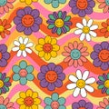 Seamless pattern with colourful smiling flowers on a rainbow background