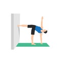 Man doing Parivrtta Ardha Chandrasana. Revolved Half Moon Pose