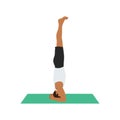 Man practicing yoga concept, standing in salamba sirsasana exercise,