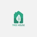 Green House Logo With Tree Negative Space Royalty Free Stock Photo