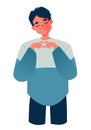 Young man in love smiles sweetly and peacefully and shows hand gesture with his hands Heart. Royalty Free Stock Photo