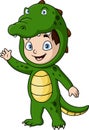 Cute little boy cartoon wearing crocodile costume