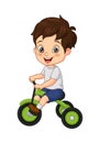 Cartoon little boy riding tricycle Royalty Free Stock Photo