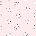 Pink seamless pattern with birds. Swallows on the pink background.