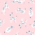 Cute funny white spotted dogs on the pink background. Dalmatian fabric design. Vector print with dogs