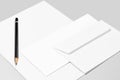 Basic stationery: sheet of paper and two envelopes Royalty Free Stock Photo