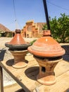 Basic tajine - shallow earthen pot named after the earthenware pot in which it is cooked - prepared in restaurant by the road