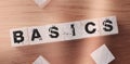 BASIC word on a wooden blocks on a light background