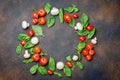 basil, champignons and tomatoes laid out in a circle Royalty Free Stock Photo