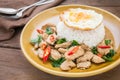 Basil fried rice with chicken and fried egg (Pad kra prao kai),