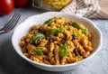 Basil leaves on pasta with arabiata sauce