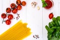 Basil, Red Cherry Tomato with Pasta on White Background Royalty Free Stock Photo