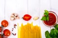 Basil, Red Cherry Tomato with Pasta on White Background Royalty Free Stock Photo