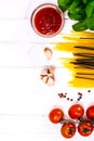 Basil, Red Cherry Tomato with Pasta on White Background Royalty Free Stock Photo