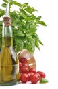 Basil, tomatoes and olive oil Royalty Free Stock Photo