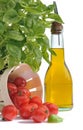 Basil, tomatoes and olive oil Royalty Free Stock Photo