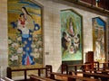 The Basilica of the Annunciation exhibits mosaics of the Madonna that express the devotion of various peoples and cultures to Mary