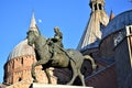 Basilica del Santo in Padua. Illuminated by the sun near sunset with the statue of Gattamelata on horseback in the foreground and