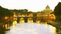 Basilica di San Pietro over Sant Angelo bridge on Tevere river at dusk Royalty Free Stock Photo