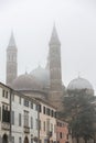 The Basilica di Sant`Antonio in Padova, Italy. Heavy fog in the city of Padova. Padua. Side view of the Basilica of St Anthony, Royalty Free Stock Photo