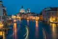 Basilica di Santa Maria della Salute and grand canal from Accademia Bridge at night in Venice, Italy Royalty Free Stock Photo