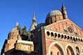 Basilica, in the evening sun, of Sant`Antonio in Padua. In the foreground, the monument dedicated to Gattamelata on horseback.