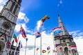 The Basilica of our Lady of the Rosary and flags of different countries against the blue sky. Lourdes, France, Hautes Royalty Free Stock Photo