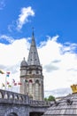 Basilica of our Lady of the Rosary and flags of different countries against the sky. Lourdes, France, Hautes Pyrenees Royalty Free Stock Photo