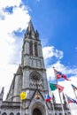 Basilica of our Lady of the Rosary and flags of different countries against the sky. Lourdes, France, Hautes Pyrenees Royalty Free Stock Photo