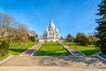 The basilica of the Sacred Heart of Paris and the stairways in the Louise Michel park Royalty Free Stock Photo