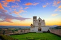 Basilica of San Francis of Assisi at sunset under beautiful orange and blue skies, Italy Royalty Free Stock Photo