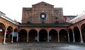 Basilica of Santa Maria dei Servi in Bologna, on the left the traditional christmas market