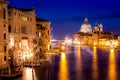 Basilica Santa Maria della Salute, Punta della Dogona and Grand Canal at blue hour sunset in Venice, Italy with reflections Royalty Free Stock Photo