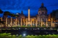 The Basilica Ulpia and the Trajan`s Column at night in Rome, Italy.