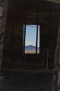 The basin mountain through the long old window Royalty Free Stock Photo