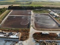 Basin or tank sedimentation tanks. Aerial top view of round polls in wastewater treatment plant, filtration of dirty or Royalty Free Stock Photo