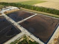 Basin or tank sedimentation tanks. Aerial top view of round polls in wastewater treatment plant, filtration of dirty or Royalty Free Stock Photo