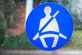 Basingstoke, UK - Jan 09 2016: Fasten seatbelt sign on the window of a public transport bus Royalty Free Stock Photo