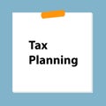 tax planning post it on blue Royalty Free Stock Photo