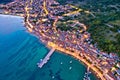 Baska. Aerial evening view of town of Baska coast and harbor