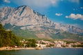 Baska Voda resort with big mountains in the background Royalty Free Stock Photo