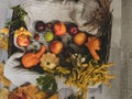 Basket with autumn vegetables and flowers.