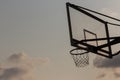 Basket ball board under sky with white clouds. Basketball court with old backboard. sky and white clouds on background. Royalty Free Stock Photo