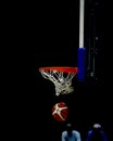 basket with the basketball ball and the black background of a sp Royalty Free Stock Photo