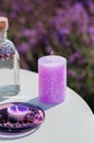 Basket with beautiful lavender in the field in Provance with Lavander water and candles. Harvesting season