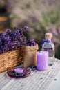 Basket with beautiful lavender in the field in Provance with Lavander water and candles. Harvesting season