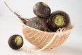 Basket with black radishes Royalty Free Stock Photo