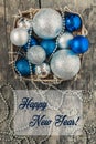 In a basket of blue and silver Christmas balls and beads, and pl Royalty Free Stock Photo