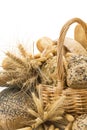 Basket with a bread assortment isolated on white Royalty Free Stock Photo