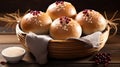 a basket of bread with cranberries on top